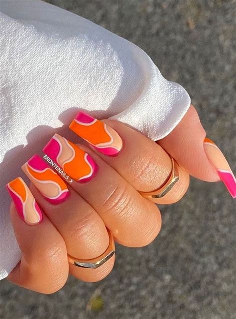 The Prettiest Summer Nail Designs Weve Saved Bright Pink And Orange Swirl Nails In 2021