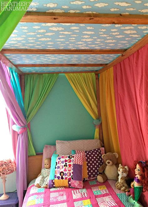 To create this look, use a hoop mechanism to hang a gauzy mosquito net from the ceiling or wall, then drape fairy lights down from the top for a soft lighting effect. DIY rainbow canopy bed {Heather's Handmade Life} | Canopy ...