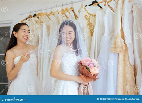 Portrait Of Beautiful Couple LGBT Lesbian Asian Bride Happiness And Funny Together Ceremony In