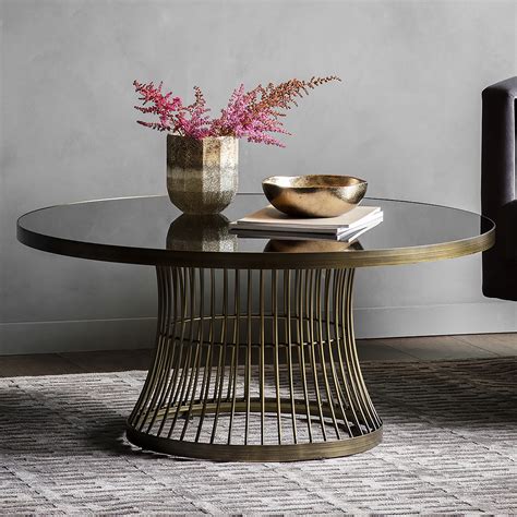 It has straight round legs with collars and conical top finials. Round Coffee Table with Smoked Glass Top - Bronze ...