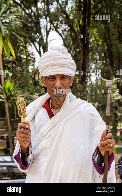 Portrait Of Ethiopian Orthodox Priest Holding The Praying Stick Addis