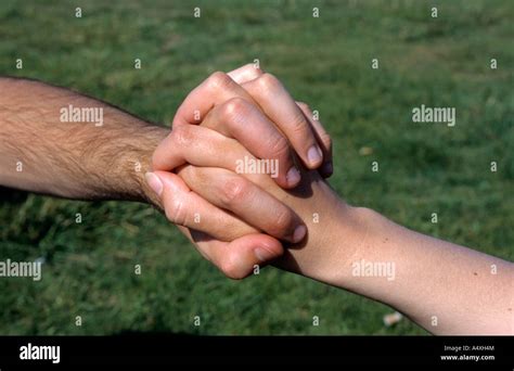 Interlinked Fingers Hi Res Stock Photography And Images Alamy