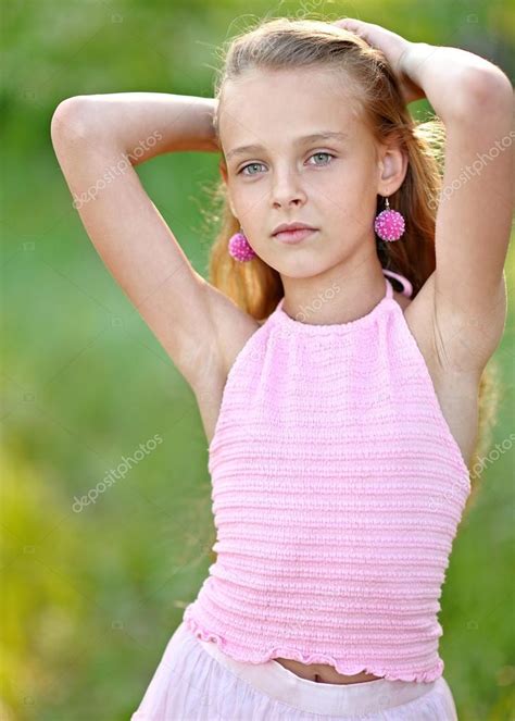 Portrait Of Little Girl Outdoors In Summer — Stock Photo © Zagorodnaya