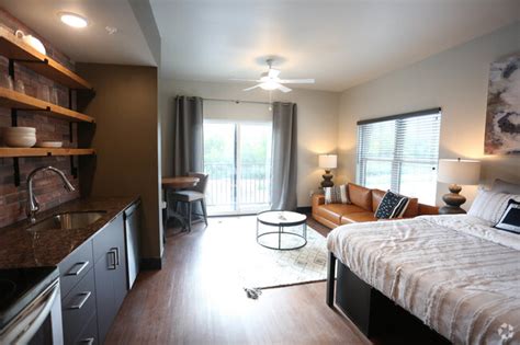Bedroom has some closet space, nightstand, shelf, and king size bed. Galloway Creek Apartments - Springfield, MO | Apartments.com
