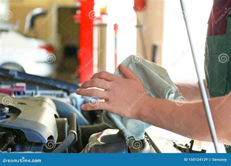 Male Mechanic Fixing Car In Service Center Stock Image Image Of