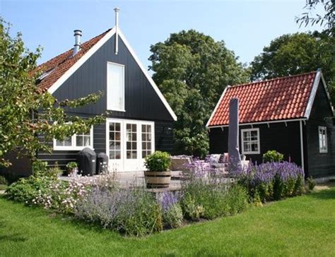 La Maison Boheme Black Cottage White Trim Exterior House Colors