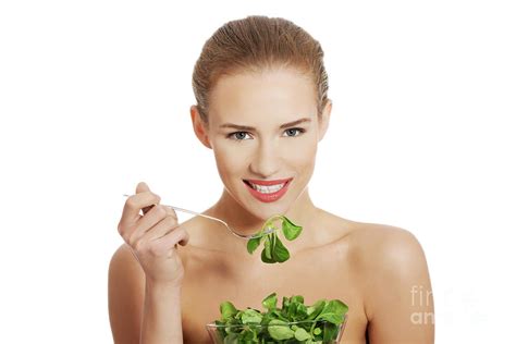 Beautiful Caucasian Topless Woman Eating Lettuce From A Bowl Wit Photograph By Piotr Marcinski