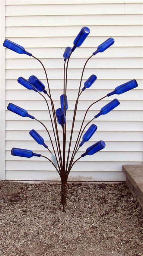 Bottle Tree Creations For Your Garden From Wisconsin Wine Bottle Trees Wine Bottle Garden Wine