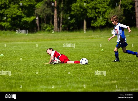 Little Boys Playing Soccer Match Stock Photo Alamy