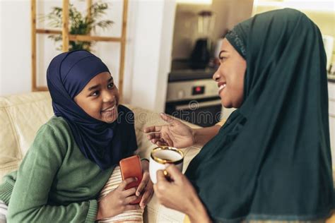 Muslim Mother And Daughter Spending Quality Time Together At Home Stock Image Image Of