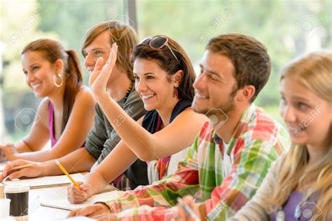 15154805 High School Student Raising Her Hand In Class Lesson Teenagers