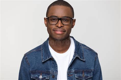 Confident Young African Man Looking At Camera Isolated On Background