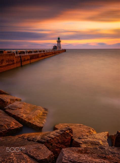 These access the sea via rivers or canals. The Lighthouse In Port Dover - Sunset at at the lighthouse ...