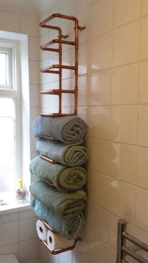 Towels of all sizes easily fit into the holder, just roll them to fit. 30 Brilliant DIY Bathroom Storage Ideas | Architecture ...