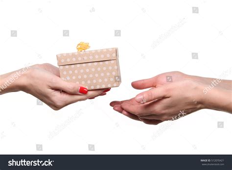 Hands Giving And Receiving A Present Stock Photo 512070421 Shutterstock