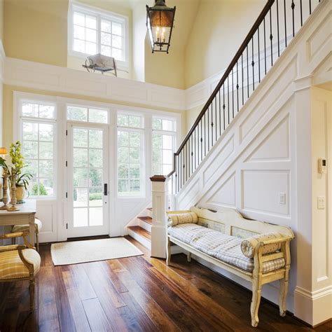 How To Decorate Foyer With Stairs Leadersrooms
