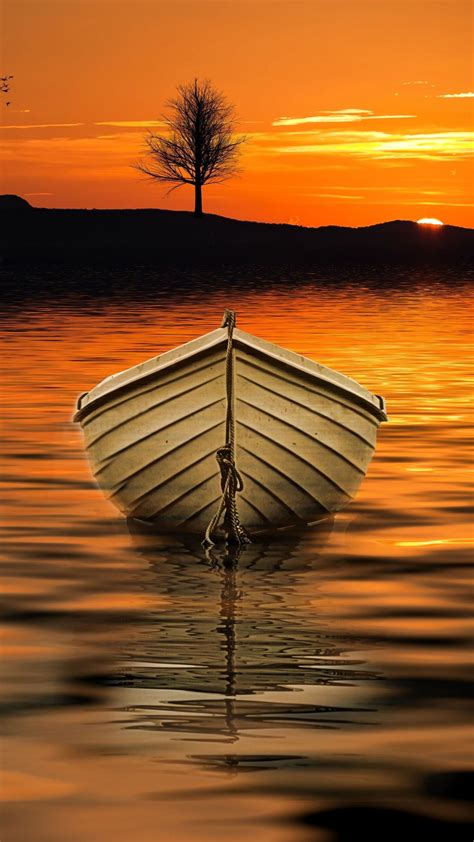 Scenic View Of A White Boat In The Sunset Wallpaper Backiee