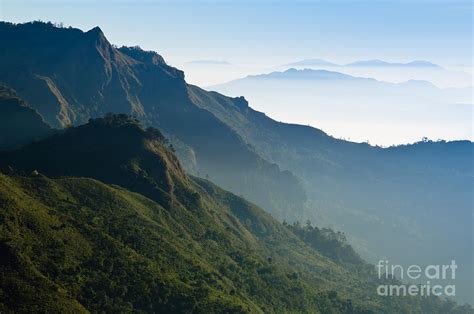 Morning Mist At Tropical Mountain Range Photograph By Noppakun Wiropart