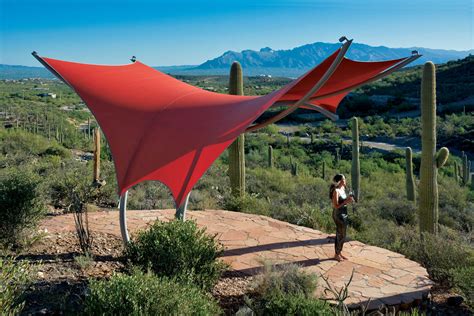 Hip structures are the most effective for covering large areas with a single application. Accessible shade for all - Fabric Architecture Magazine