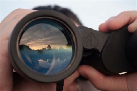Man Looking Through Binoculars Stock Photo Download Image Now Istock