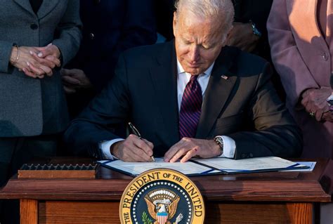 President Joe Biden Signs The Bipartisan Infrastructure Investment And