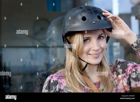 Woman Wearing Bicycle Helmet Outdoors Stock Photo Alamy
