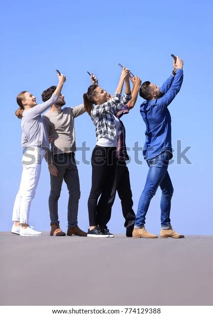 Rear View Happy Friends Doing Selfie Stock Photo 774129388 Shutterstock