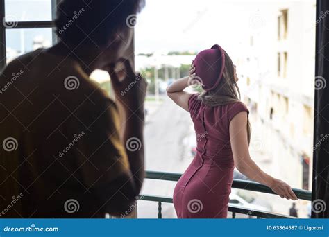 Man Admiring Beautiful Lady In Fitted Dress Stock Image Image Of