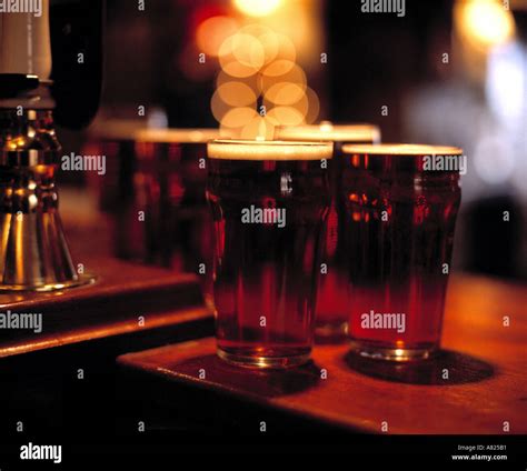 Pints Of Beer On Bar Stock Photo Alamy