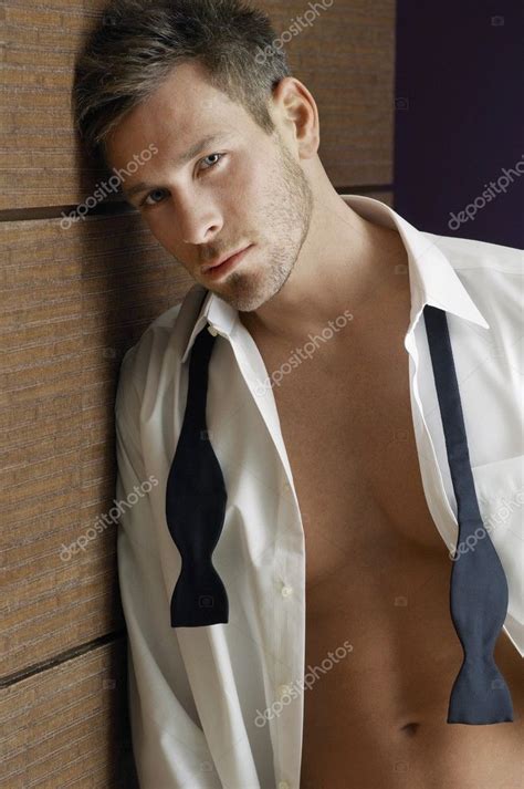 Handsome Man Wearing Unbutton Shirt Stock Photo By Londondeposit 21944159