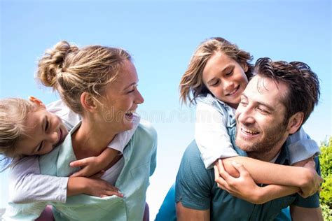 Happy Parents With Their Children Stock Image Image Of Holding