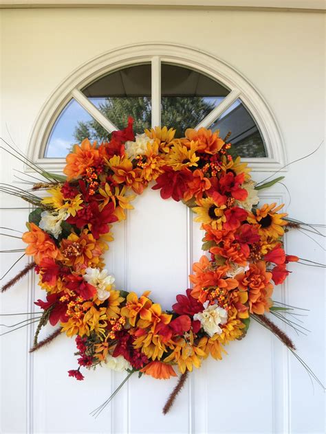 May 16, 2018 · one of the things that i used that probably isn't associated with fancy hats was a loofah. Fall Wreath made with dollar store flowers | Fall wreath ...