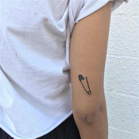 safety pin by tattooist yeahdope inked on the right arm safety pin tattoo small tattoos