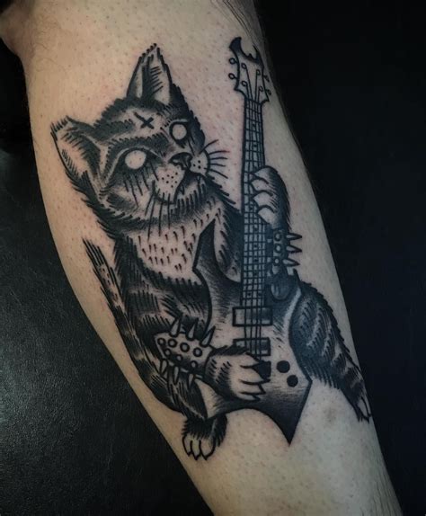 Stunning Black Metal Kitty Tattoo