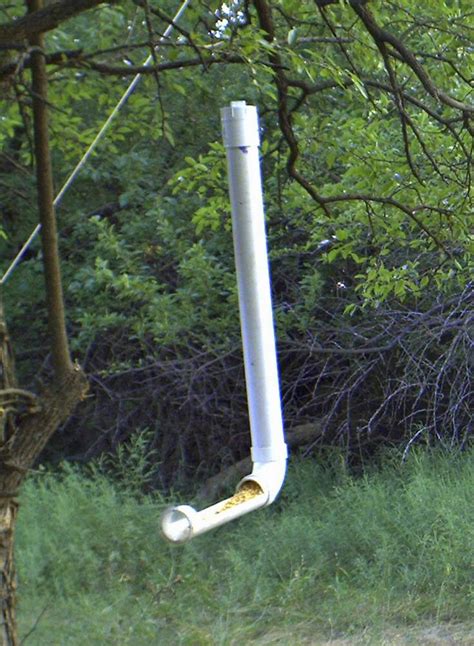 Homemade deer feeder constructed from pvc pipe, fitting, end cap, and bungee cords. How to Make PVC Deer Feeders | hubpages