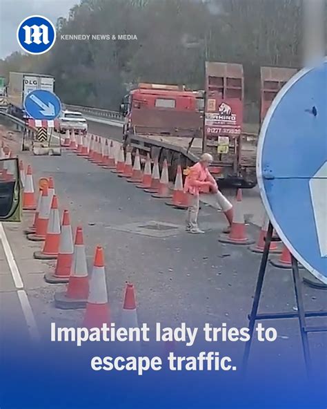 Frustrated Elderly Woman In Queue Starts Moving Traffic Cones Traffic Woman Traffic Cone