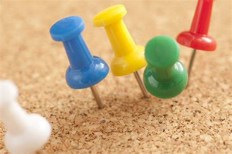 Free Image Of Close Up Colored Pins On Cork Board Freebiephotography