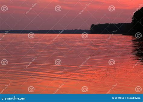 Pink Sunset Over Water Stock Photos Image 3594053