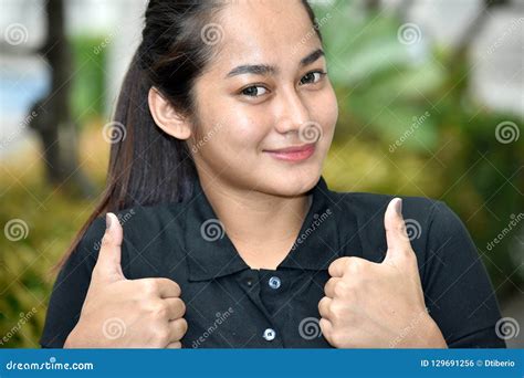 filipina teen girl with thumbs mignon photo stock image du adolescente femelle 129691256