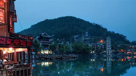 China House Buildings Hills Trees Lake Water Night Sunset