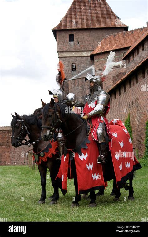 Medieval Cavalry Knights On Military Horses Presenting Themselves To