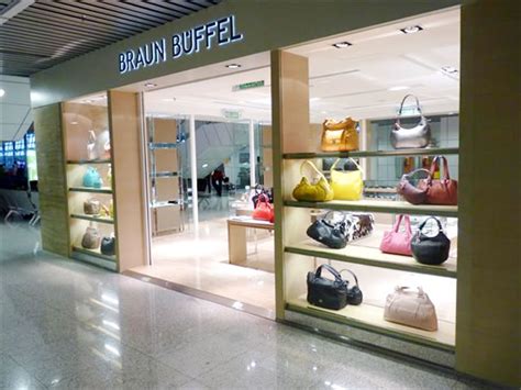 Braun buffel mens leather credit card holder wallet brown. Braun Büffel opens flagship boutique at Kuala Lumpur ...