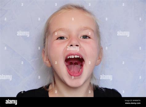 Portrait Of Girl With Smile And Open Mouth Stock Photo Alamy