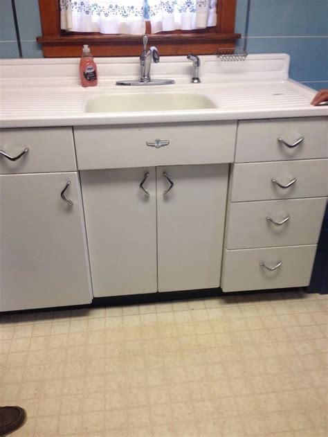 There is a 54 sink base cabinet and a white porcelain single bowl sink with double drain boards, two 15x30 wall cabinets, two 21x18 wall. VINTAGE YOUNGSTOWN Kitchen by Mullins Metal Sink Cabinet with Drainboard- RETRO # ...