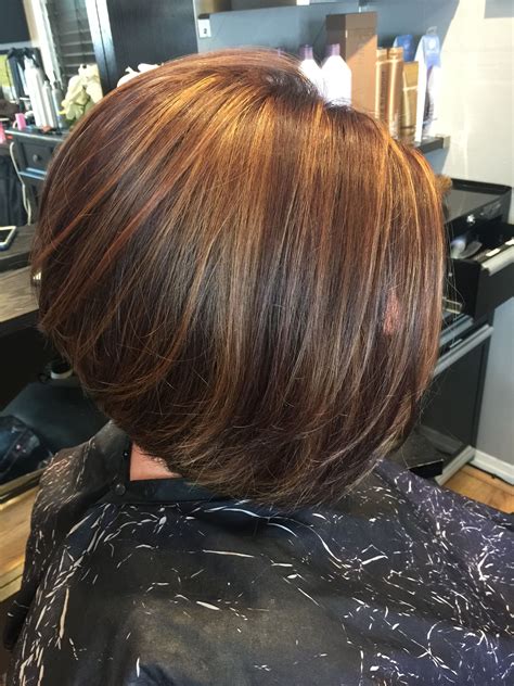Beautiful a-line bob with a dark copper and highlights! | Brunette hair