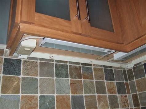 A loooong time ago i shared how to add the under cabinet lighting when you don't have them hardwired. angled plugmold to hide kitchen outlets. Plugmolds hide ...