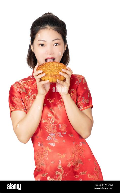 Beautiful Chinese Woman Wearing A Cheongsam Or Chipao Holding A Moon