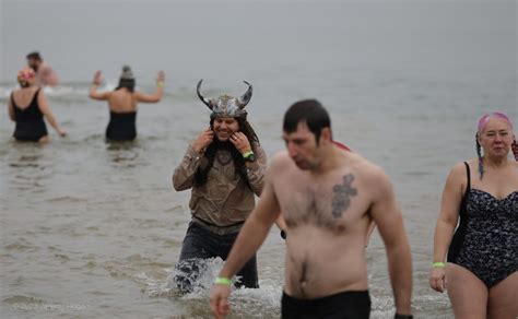 New Years Day Tradition Brave Souls Take Icy Polar Plunge Into Lake
