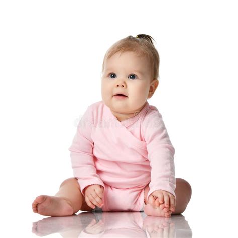 8 Month Infant Child Baby Girl Toddler Sitting In Pink Shirt Isolated