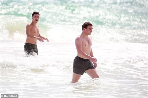 Rocco Ritchie Goes Shirtless As He Performs Headstands On The Beach In